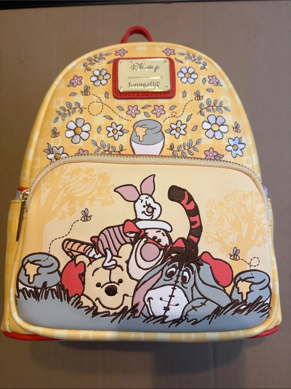Loungefly Yellow Winnie the Pooh & Friends Mini Backpack